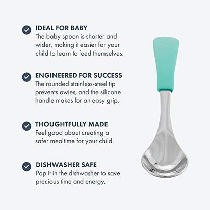 Baby holding Avanchy silicone and steel training spoon