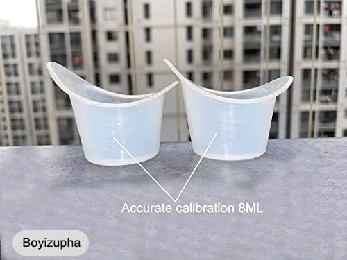 Soft silicone eye rinse tool showing measurement scale and flexible rim