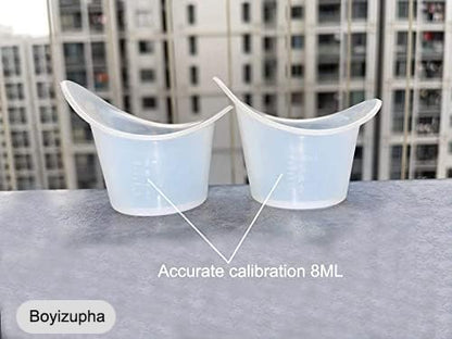Soft silicone eye rinse tool showing measurement scale and flexible rim