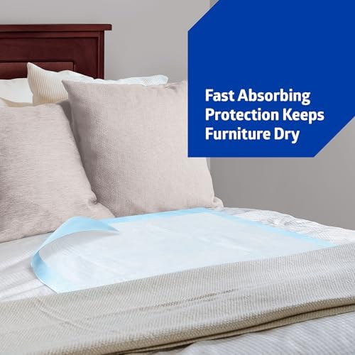 Fluff filled incontinence bed pads spread flat on a mattress.