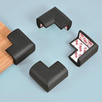 Baby proofing rubber foam edge guard on wooden table