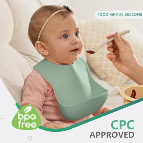 Cuddle Campus adjustable soft silicone bib neckband close up showcasing multiple sizing options.