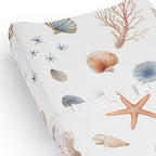 Lifestyle nursery display featuring the gender-neutral nautical theme changing pad cover.