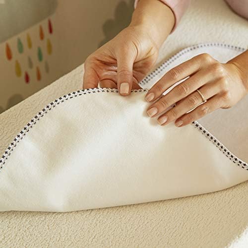 White waterproof changing pad liners showing soft fabric texture