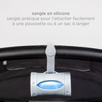 Ubbi travel bag dispenser demonstrating the twist retract mechanism
