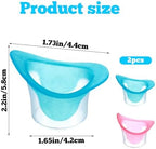 Ergonomic silicone eye bath cup being held for manual eye rinsing
