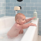 Side profile of Mushie rainbow arch bath spout protector