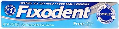 Fixodent mint denture adhesive cream sealing gum line to block food particles
