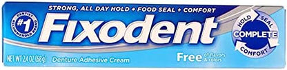 Fixodent mint denture adhesive cream sealing gum line to block food particles