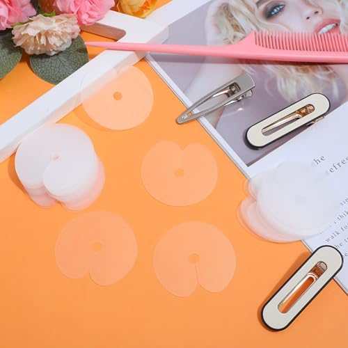 A pack of 50 clear PVC heat shield discs used for safe feather and keratin hair extension installation.