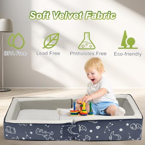JOYWOO toddler travel bed laid out flat on a bedroom floor for naptime setup.