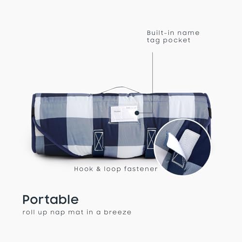 Close up view of the detachable plush pillow and attached microfiber blanket