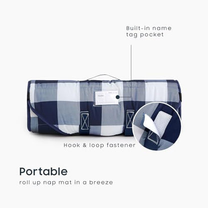 Close up view of the detachable plush pillow and attached microfiber blanket