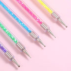 Detailed view of various dotting tool ball sizes