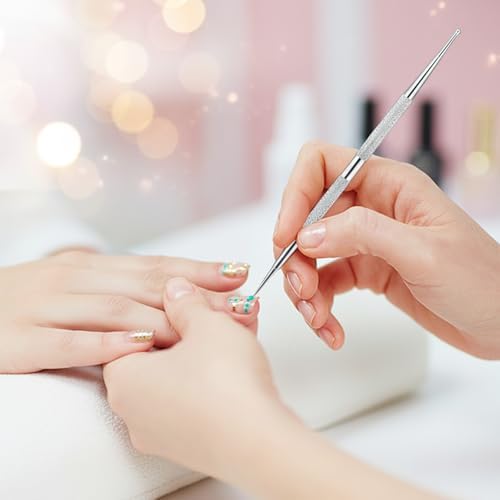 Demonstration of Fairy Cora dotting tools creating patterns on nails