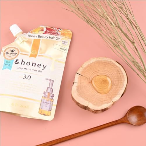 Close up view of the &honey triple honey blend hair oil refill pouch texture.