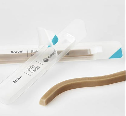 Moldable alcohol free ostomy barrier strip paste for filling skin folds