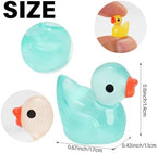 Miniature duck figures displayed next to a ruler showing the 1.5x1.8 centimeter sizing