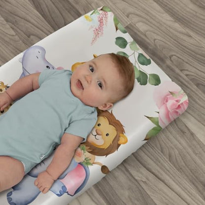 Flat lay of safari theme nursery changing cover