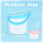 Pink and blue portable eye bath kit tools spread out on a white surface.
