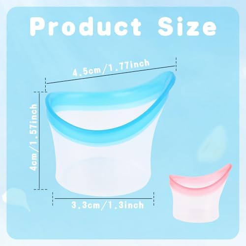 Pink and blue portable eye bath kit tools spread out on a white surface.