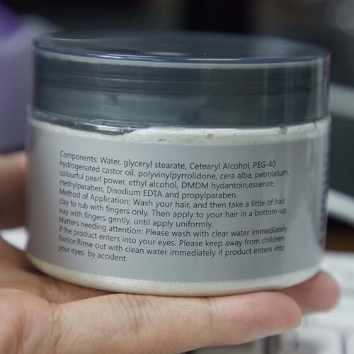 Applying Efly temporary hair wax to hair strands