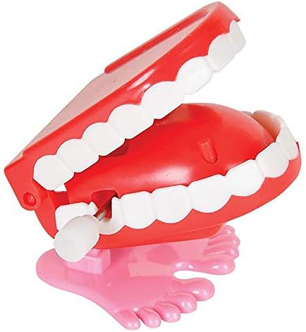 Classic red mechanical chomping teeth novelty toys standing side by side