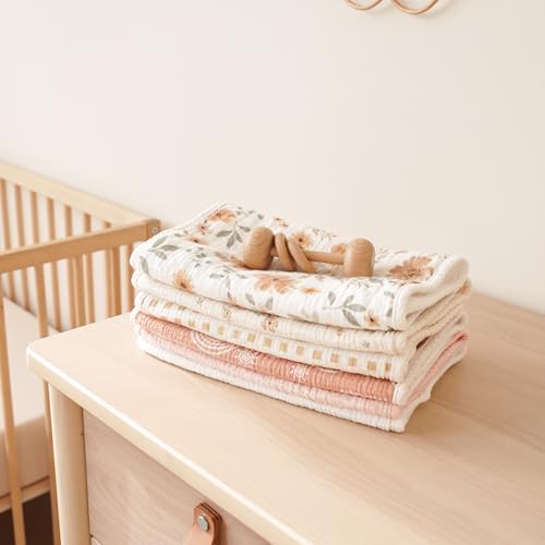 Soft and absorbent multi functional baby washcloth and burp towel set in neutral shades.