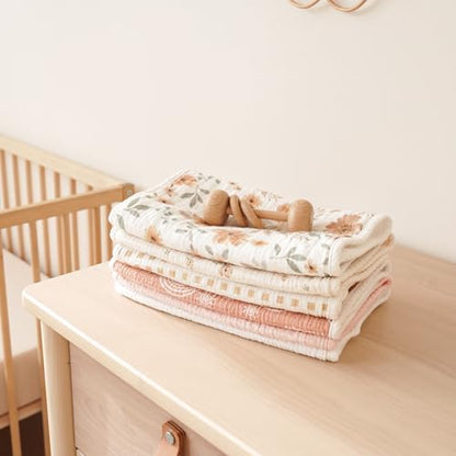 Soft and absorbent multi functional baby washcloth and burp towel set in neutral shades.
