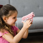 Portable pocket sized ADHD clicking toy gun package including both color variants