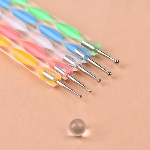 Side view of double ended nail art pens showing variety of sizes