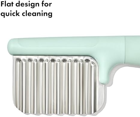 Authentic imported kids safe wavy edge chopping knife on a clean kitchen counter