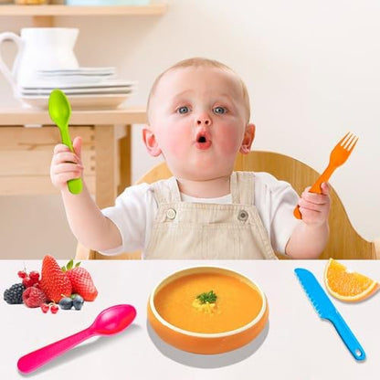 Child using Jawbush BPA free fork and spoon set