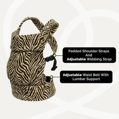 Parent wearing Nest Blanche carrier with baby in M-shape position