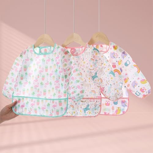 Side view of HaimoBurg long sleeve baby smock showing sleeve protection