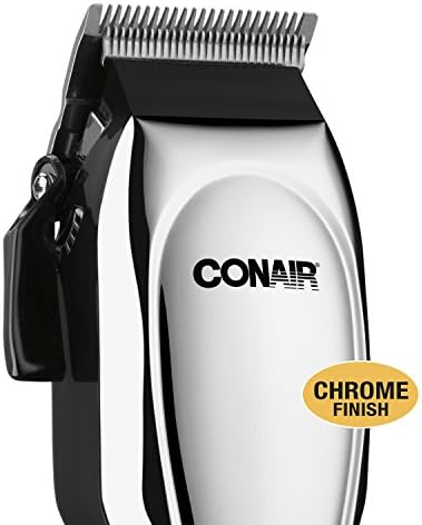 Complete contents of the Conair 21-piece haircut kit arranged neatly with guide combs and styling scissors.