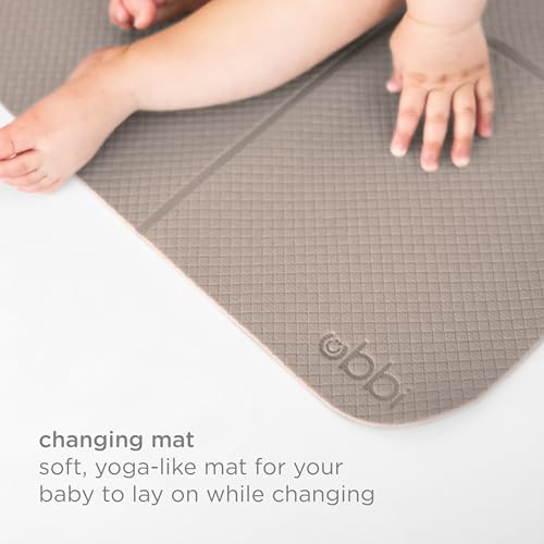 Side view of Ubbi cushioned diaper changing mat for newborns