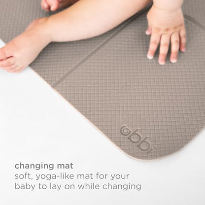 Side view of Ubbi cushioned diaper changing mat for newborns