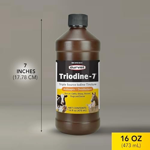 Durvet Triodine-7 antiseptic solution bottle held for scale