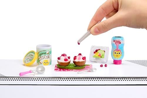 MGA's Miniverse Series 6 capsule opened showing secret recipe ingredients and mini accessories.