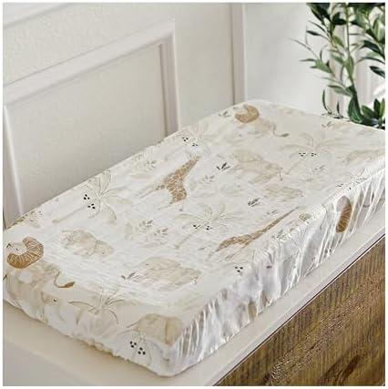 Crane Baby jungle theme quilted changing pad cover showcasing the earthy tones of hand screen printed lions and giraffes.