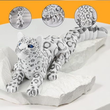 Snow leopard 3D printed figurine displayed on an office desk