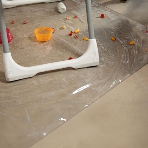 Durable clear vinyl protective mat laid flat on a kitchen floor displaying its generous square dimensions