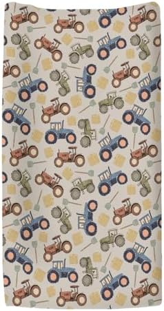 Detailed view of farm tractor print on nursery changing pad sheet