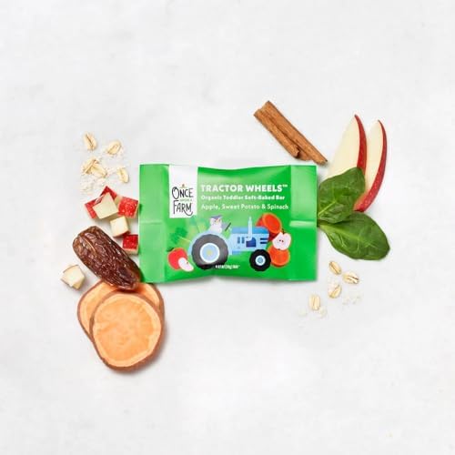 Close-up of the textured wheel shaped organic oat bars highlighting the soft-baked toddler-friendly design.