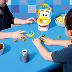 Two plastic launchers aiming soft poop projectiles into the talking toilet bowl base.