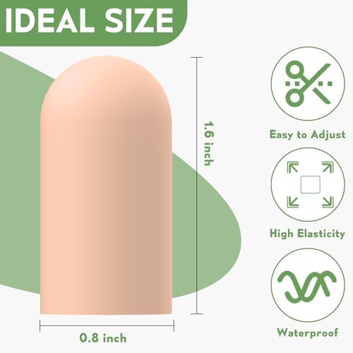 Trimming a nude color rubber finger sleeve with scissors to demonstrate custom length adjustments.