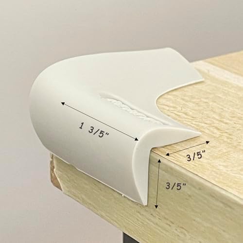 Angloria gray corner protectors applied to a wooden cabinet edge