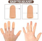 Elastic finger support gloves being worn to relieve hand arthritis pain while typing.