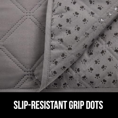 Gorilla Grip 30x70 inches pet throw laid out flat on a fabric sectional sofa.